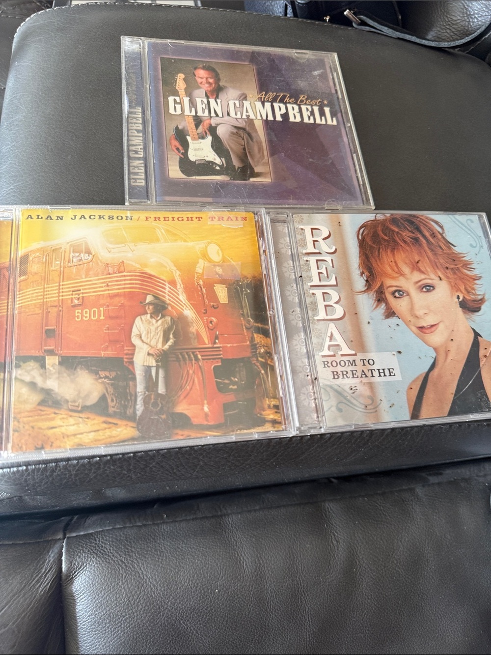 Alan Jackson, Glen Campbell and Reba McIntyre cds. Great condition